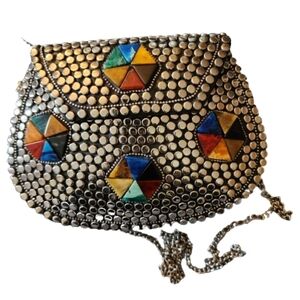 Handmade Multicolored textured metal clutches color silver